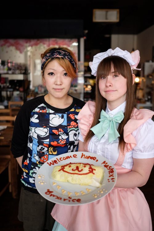 Dwarf no Cachette, a Japanese restaurant that incorporates cos-play, anime and japanese subculture into its offerings. Owner Yasuko Akimoto (left) with Ashley Wakely one of the waitresses dressed as her maid character, Ichigo or Strawberry, holding Omurice, chicken fried rice draped by fried egg. 150609 - Tuesday, June 09, 2015 -  MIKE DEAL / WINNIPEG FREE PRESS