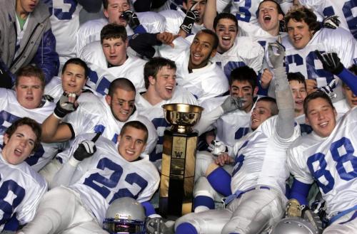 BORIS MINKEVICH / WINNIPEG FREE PRESS  071112 Oak Park Raiders vs. Sisler Spartins Oak Park with the Championship Cup.