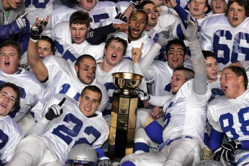 BORIS MINKEVICH / WINNIPEG FREE PRESS  071112 Oak Park Raiders vs. Sisler Spartins Oak Park with the Championship Cup.