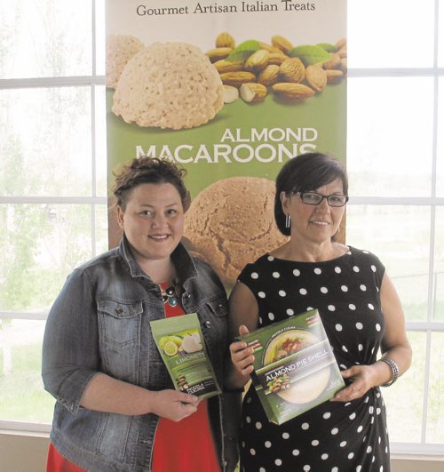 Canstar Community News June 3, 2015 - Piccola Cucina's Tina (left) and Anita Romolo are proud that their company has been named in Food in Canada Magazine's "Top 10 food and beverage companies to watch" for 2015. (SHELDON BIRNIE/CANSTAR COMMUNITY NEWS/THE HERALD)