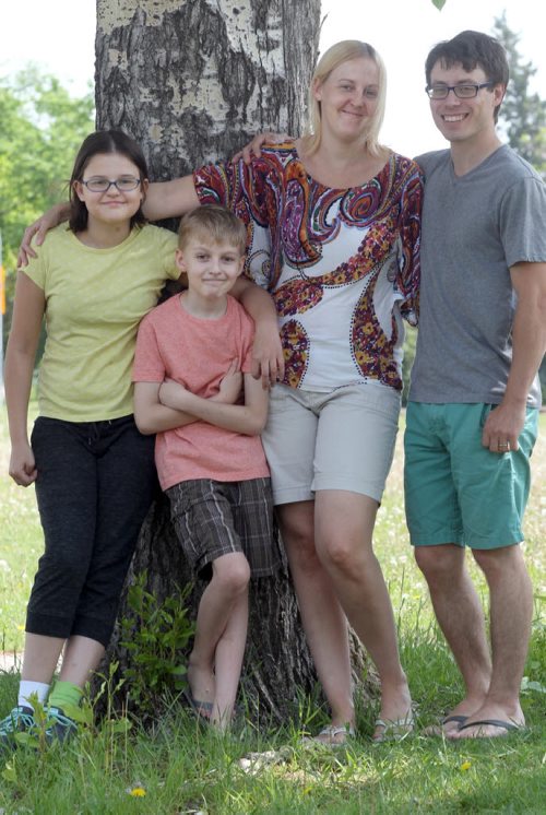 Mom Rebecca Norman and Dad Thomas Norman with their kids Payton Mitchell, 13 years ( Girl) and Malin Nordquist  The two kids will get a opportunity this summer to go to camp- See Aidan Geary Sunshine Fund story- June 10, 2015   (JOE BRYKSA / WINNIPEG FREE PRESS)