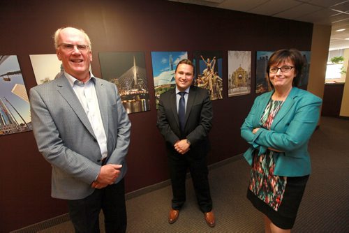 YES-Winnipeg, Vince Bartella (center) poses with Doug Harvey and Marina James at Economic Development WInnipeg. See Martin Cash story. June 10, 2015 - (Phil Hossack / Winnipeg Free Press)