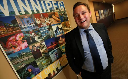 YES-Winnipeg, Vince Bartella (center) at Economic Development WInnipeg. See Martin Cash story. June 10, 2015 - (Phil Hossack / Winnipeg Free Press)