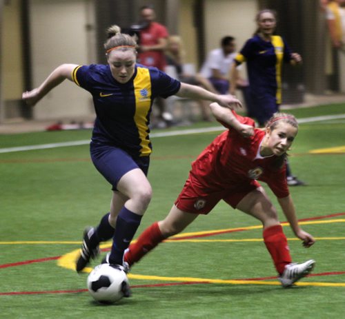 Australian #9 (Jeff will call with the name) deeks around Bonivital's #2 Jenna Neumann Wednesday. The older and more experienced Australian team showed the Canadians a few things from down under.  See Jeff Hamilton's story. June 10, 2015 - (Phil Hossack / Winnipeg Free Press)