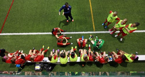 Gesturing at half time, team Bonivital coach Jarret ??? did his best to illustrate how the Australians were mopping the pitch with his team.  See Jeff Hamilton's story. June 10, 2015 - (Phil Hossack / Winnipeg Free Press)