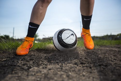 Goalkeeper Chandra Bednar plays on a soccer field in the West End of Winnipeg on Wednesday, June 10, 2015.  Bednar has been playing for 15 years, and is hoping to go pro in Europe soon, but practicing on the hard dirt scrapes her elbows every time she dives to save the ball. Mikaela MacKenzie / Winnipeg Free Press