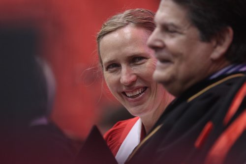 Honorary Doctor of Letters, Miriam Toews, shares a laugh with Neil Besner, Provost and Vice-President, Academic at the UofW during the University of Winnipeg's 105th Spring Convocation  at Duckworth Centre Thursday morning.  150611 June 11, 2015 MIKE DEAL / WINNIPEG FREE PRESS