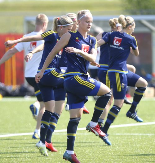 Team Sweden including Nilla Fischer in foreground do some twists during the warm up at the team practice at the Winnipeg Soccer Complex Thursday preparing for the game against the USA Friday. Wayne Glowacki / Winnipeg Free Press June 11 2015