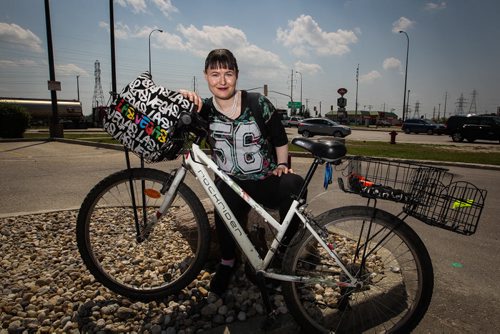 Candace Corroll rides her bike on Pembina Highway almost every day all year in almost every weather condition. The challenge is when she, like most cyclists, reaches the Pembina Hwy overpass. The special bike lanes end right before the overpass. 150611 - Thursday, June 11, 2015 -  MIKE DEAL / WINNIPEG FREE PRESS