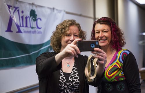 Nicole Chammartin (left), executive director of Klinic Community Health Centre, and Sharon Blady, MLA for Kirkfield Park, take a selfie before talking about support for transgendered people at the Klinic Community Health Centre in Winnipeg on Friday, June 12, 2015.  Mikaela MacKenzie / Winnipeg Free Press
