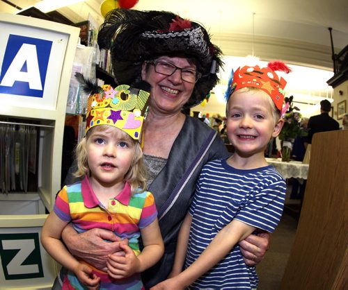 LOCAL - 100th anniversary of St. John's Library. l-r Kivrin Piché, 2, and Silas Piché,4, with their grandma ,centre, Nellie Groening who works at the library. Groening dressed up in period correct attire. BORIS MINKEVICH/WINNIPEG FREE PRESS June 12, 2015