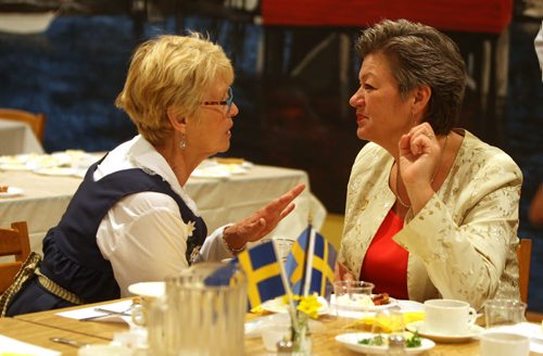 A bunch of Swedish people are at the Scandanavian Cultural Centre at 764 Erin St. Kirbyson story. (L-R) The Swedish Cultural Association of Manitoba past president Sonja Lundström talks to Ylva Johansson, Sweedish government minister of Employment. BORIS MINKEVICH/WINNIPEG FREE PRESS June 12, 2015