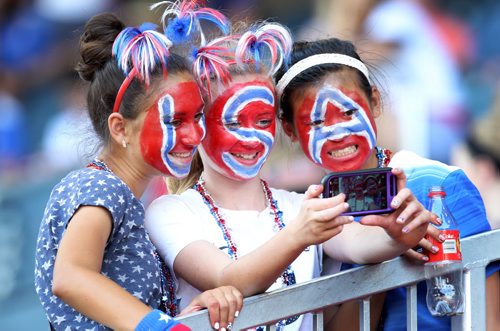 USA fans take a selfie before the FIFA Womens World cup game between team Nigeria and Australia at Investors Group Field  Friday night. USA fans are waiting for  the game tonight between USA and Sweden- Standup Photo- June 12, 2015   (JOE BRYKSA / WINNIPEG FREE PRESS)