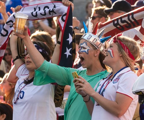 Lady Liberty toasts the U.S. Women's National Team as they enter the stadium for their match against Sweden at the FIFA Women's World Cup in Winnipeg.  June 12, 2015 - MELISSA TAIT / WINNIPEG FREE PRESS