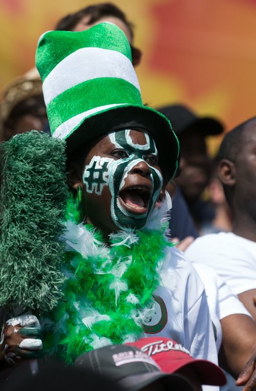 Nigerian soccer fan Oleuaseun Akinmuyisitan cheers on Nigeria (who lost 2-0 to Australia) at the FIFA Women's World Cup in Winnipeg. June 12, 2015 - MELISSA TAIT / WINNIPEG FREE PRESS