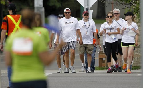 Participants head along Broadway during the 20km Challenge for Life CancerCare Walk, Saturday, June 13, 2015. (TREVOR HAGAN/WINNIPEG FREE PRESS)