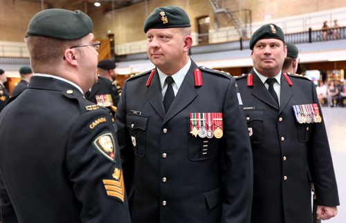 Representatives of each of the 13 Army Reserve Units attended a Change of Command Ceremony at Minto Armouries from Colonel Ross Ermel, middle, to Colonel Geoffrey Abthorpe, right, Saturday, June 13, 2015. (TREVOR HAGAN/WINNIPEG FREE PRESS)