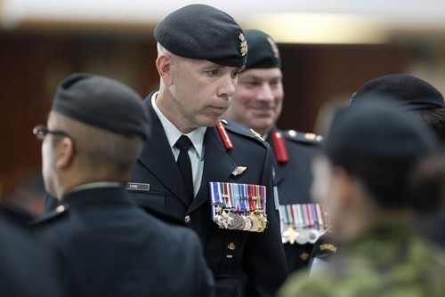 Reviewing Officer, Brigadier-General Eyre, speaking with representatives of each of the 13 Army Reserve Units attended a Change of Command Ceremony at Minto Armouries from Colonel Ross Ermel to Colonel Geoffrey Abthorpe, Saturday, June 13, 2015. (TREVOR HAGAN/WINNIPEG FREE PRESS)