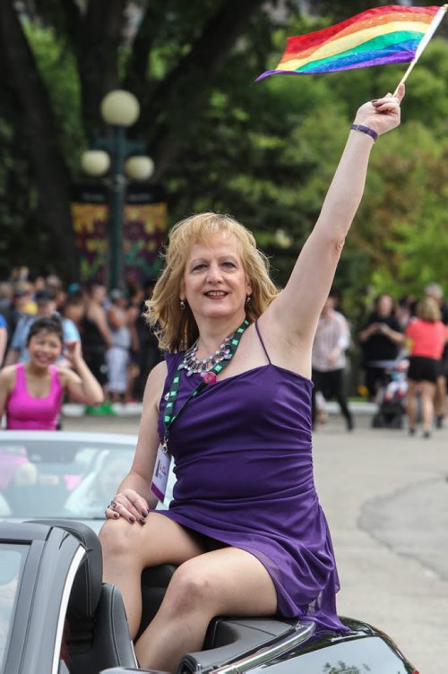 Shandi Strong leads the parade as the Grand Marshal of the 28th Anniversary of the Winnipeg Pride Parade Sunday afternoon. 150614 - Sunday, June 14, 2015 -  MIKE DEAL / WINNIPEG FREE PRESS