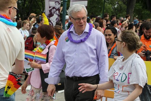 Manitoba Premier Greg Selinger walks the parade route along with hundreds who showed up to take part in the 28th Anniversary of the Winnipeg Pride Parade Sunday afternoon. 150614 - Sunday, June 14, 2015 -  MIKE DEAL / WINNIPEG FREE PRESS