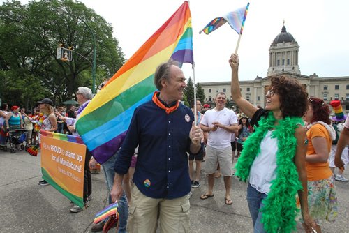 Manitoba NDP MP Pat Martin walks the parade route along with hundreds who showed up to take part in the 28th Anniversary of the Winnipeg Pride Parade Sunday afternoon. 150614 - Sunday, June 14, 2015 -  MIKE DEAL / WINNIPEG FREE PRESS