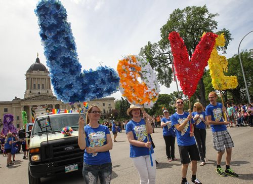 Hundreds showed up to take part in the 28th Anniversary of the Winnipeg Pride Parade Sunday afternoon. 150614 - Sunday, June 14, 2015 -  MIKE DEAL / WINNIPEG FREE PRESS