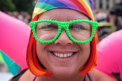 Lisa Butler is all smiles as she takes part in the 28th Anniversary of the Winnipeg Pride Parade Sunday afternoon. 150614 - Sunday, June 14, 2015 -  MIKE DEAL / WINNIPEG FREE PRESS