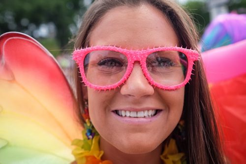 Erin Stanley is all smiles as she takes part in the 28th Anniversary of the Winnipeg Pride Parade Sunday afternoon. 150614 - Sunday, June 14, 2015 -  MIKE DEAL / WINNIPEG FREE PRESS