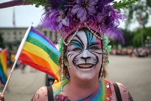 Leanne Cater is all smiles as she takes part in the 28th Anniversary of the Winnipeg Pride Parade Sunday afternoon. 150614 - Sunday, June 14, 2015 -  MIKE DEAL / WINNIPEG FREE PRESS