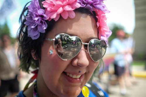Michelle Ducharme is all smiles as she takes part in the 28th Anniversary of the Winnipeg Pride Parade Sunday afternoon. 150614 - Sunday, June 14, 2015 -  MIKE DEAL / WINNIPEG FREE PRESS