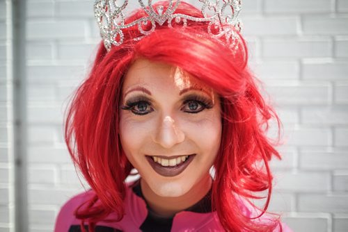 Serenity LaDasha is all smiles as she takes part in the 28th Anniversary of the Winnipeg Pride Parade Sunday afternoon. 150614 - Sunday, June 14, 2015 -  MIKE DEAL / WINNIPEG FREE PRESS