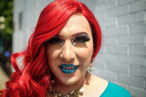 Satina Loren is all smiles as she takes part in the 28th Anniversary of the Winnipeg Pride Parade Sunday afternoon. 150614 - Sunday, June 14, 2015 -  MIKE DEAL / WINNIPEG FREE PRESS