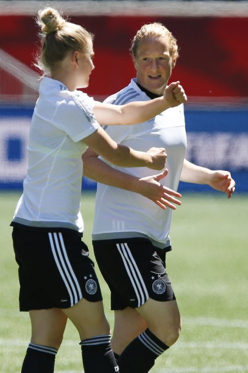 June 14, 2015 - 150614  -  Germany's Melanie Behringer (7) talks to a teammate during practice in Winnipeg Sunday, June 14, 2015. John Woods / Winnipeg Free Press