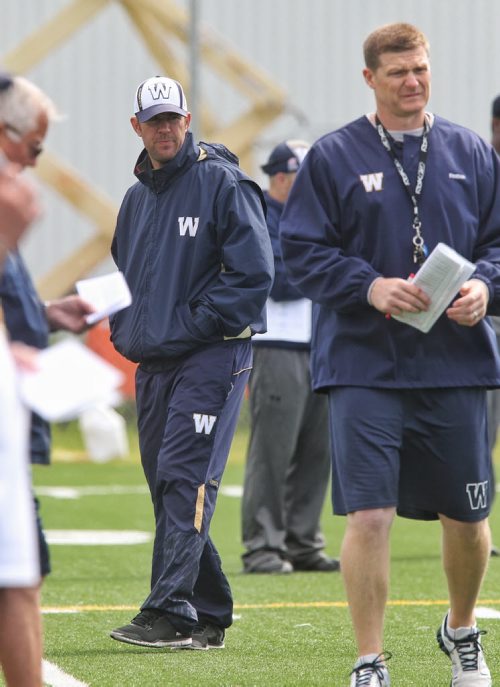 General Manager Kyle Walters (left) during Winnipeg Blue Bombers practice Monday morning.  150615 June 15, 2015 MIKE DEAL / WINNIPEG FREE PRESS