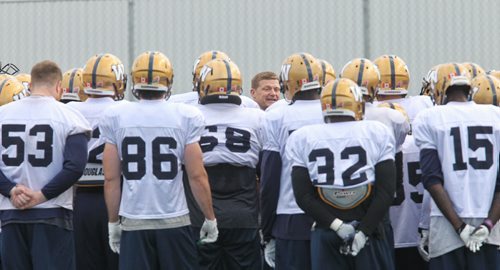 Head Coach Mike O'Shea talks to players during Winnipeg Blue Bombers practice Monday morning.  150615 June 15, 2015 MIKE DEAL / WINNIPEG FREE PRESS
