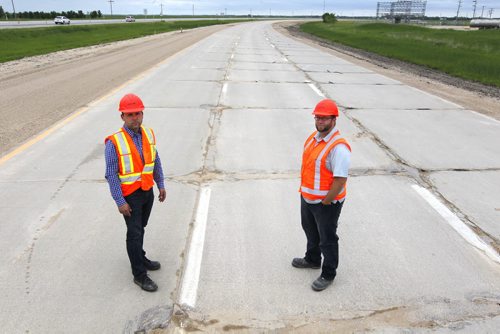 (L-R) Larry Halayko, Director for contract services-Manitoba Infrastructure and Transportation and Steve Penner, Sr. Project Manager-Manitoba Infrastructure and Transportation.  Dan Lett feature on hwy 75 construction - comparing canada/US.  Here they stand on some real rough road they are gonna replace near Ste. Agathe, MB.  BORIS MINKEVICH/WINNIPEG FREE PRESS June 25, 2014