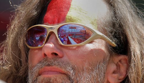 A German Fan painted in the flag's colors glasseses reflect Investor's Field at Monday's FIFA Match at Investors Field in Winnipeg. See story. June 15, 2015 - (Phil Hossack / Winnipeg Free Press)
