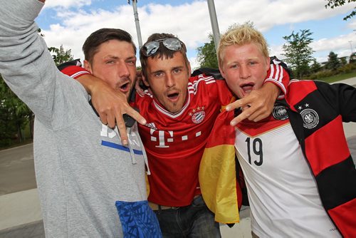 German fans (l-r) Daniel Klassen, Alex Gossen and David Dik get into the spirit as they approach the entrance to the stadium for the FIFA Women's World Cup match between Germany and Thailand Monday afternoon in Winnipeg.  150615 June 15, 2015 MIKE DEAL / WINNIPEG FREE PRESS