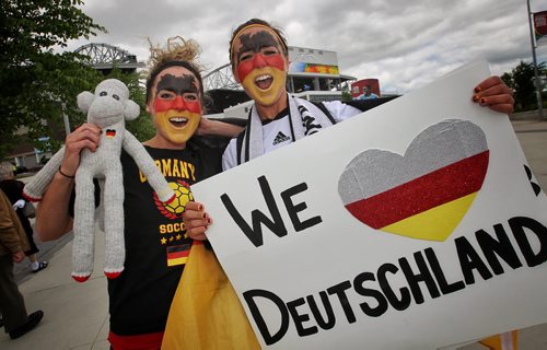 German fans and sisters Kim and Sarah Rapko (right) get into the spirit as they approach the entrance to the stadium for the FIFA Women's World Cup match between Germany and Thailand Monday afternoon in Winnipeg.  150615 June 15, 2015 MIKE DEAL / WINNIPEG FREE PRESS