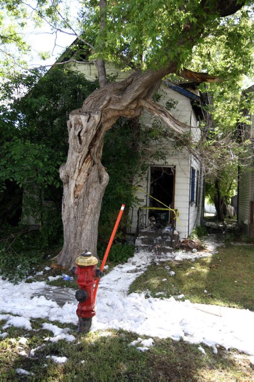 343 Kensington Street. Here is a snap of the house that was destroyed by fire. Cops were still parked outside at 8am. Fire supposedly started at 5 am. BORIS MINKEVICH/WINNIPEG FREE PRESS June 15, 2015