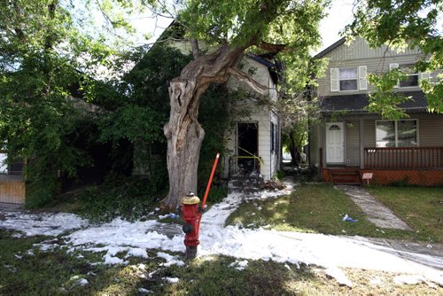 343 Kensington Street. Here is a snap of the house that was destroyed by fire. Cops were still parked outside at 8am. Fire supposedly started at 5 am. BORIS MINKEVICH/WINNIPEG FREE PRESS June 15, 2015