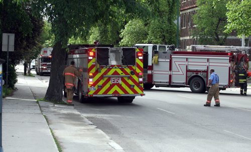 Crews pack up from a minor fire scene at 620 William. For files. BORIS MINKEVICH/WINNIPEG FREE PRESS June 15, 2015