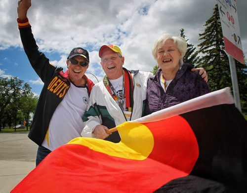 German fans Wolfgang Fritzsche, Manny Meissner (centre) and Rita Meissner (right) get into the spirit as they approach the entrance to the stadium for the FIFA Women's World Cup match between Germany and Thailand Monday afternoon in Winnipeg.  150615 June 15, 2015 MIKE DEAL / WINNIPEG FREE PRESS