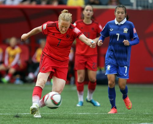 Germany's #7 Melanie Behringer walks away from Thailand's #7 Silawan Intamee Monday at Investor's Field in FIFA Action. See Story. June 15, 2015 - (Phil Hossack / Winnipeg Free Press)