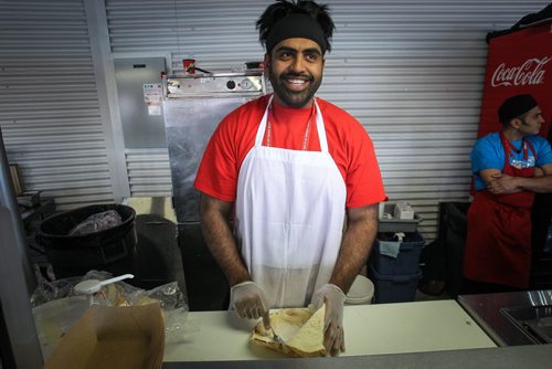 Obby Khan at one of his Shawarma kiosks on the concourse of Investors Group Field during the FIFA Women's World Cup match of Germany against Thailand Monday afternoon. 150615 - Monday, June 15, 2015 -  MIKE DEAL / WINNIPEG FREE PRESS