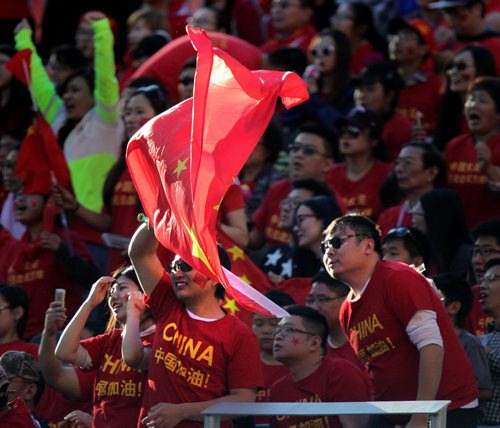 Chinese fans cheer their team to a tie with New Zealand Monday at Investor's FIeld in FIFA action. See Story. June 15, 2015 - (Phil Hossack / Winnipeg Free Press)