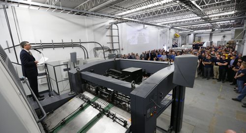 Curwin Friesen, CEO, Friesens Corporation in Altona,Mb. at the podium on their new MAN Roland press speaks to a pressroom full of employees and business leaders Tuesday.  Martin Cash story Wayne Glowacki / Winnipeg Free Press June 16  2015