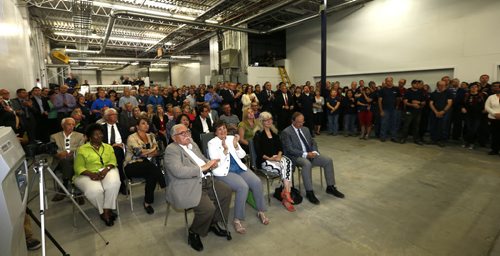 Business leaders and emloyees of Friesens attending the ceremony for their new MAN Roland press at Friesens in Altona Tuesday.  Martin Cash story Wayne Glowacki / Winnipeg Free Press June 16  2015