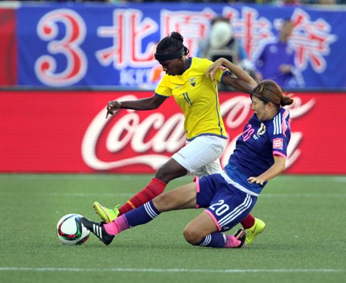 Equador's #11 Monica Quinteros and Japan's #20 Yuri Kawamura tangle for possession Tuesday. Japan prevailed 1-0 in the final Winnipeg FIFA match.. See story.June 16, 2015 - (Phil Hossack / Winnipeg Free Press)
