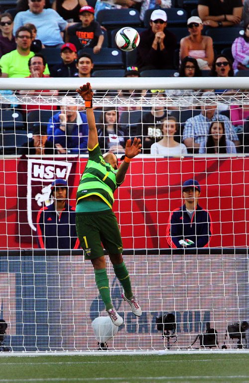 Equador's netminder #1 Shirley Berruz goes high to deflect a Japanese attempt late in the game Tuesday afternoon at Investor's Field. Japan prevailed 1-0 to win the last Winnipeg FIFA match. See story. June 16, 2015 - (Phil Hossack / Winnipeg Free Press)